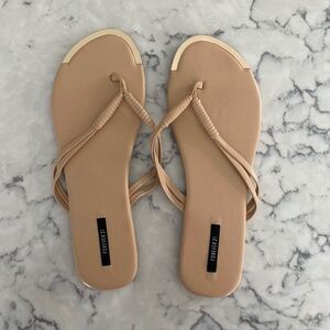 Nude flip flops
